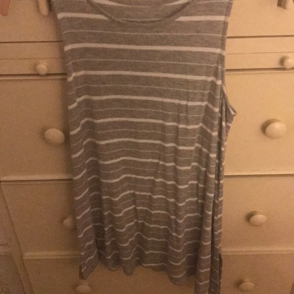 Is gray and white striped long shirt